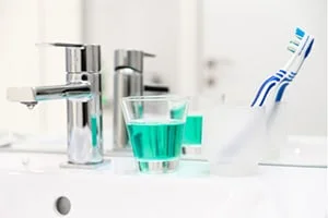 mouthwash and toothbrush