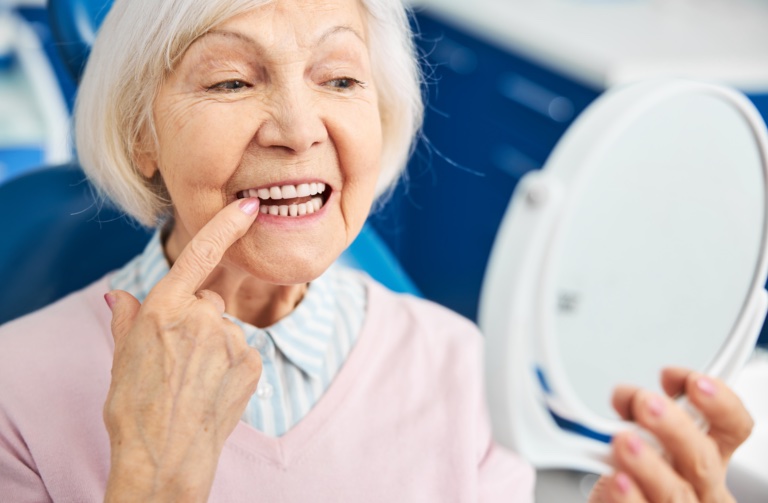Woman Checking Teeth